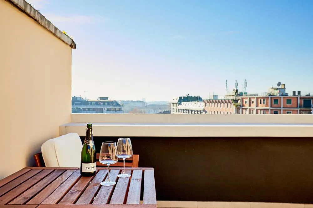 Rooftop terrace in Navigli with Franciacorta and Milan skyline